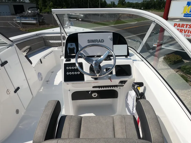Slide: The Image of Close-up of a Yamaha 300 V6 4.2L outboard engine on a 2024 Sea Pro 240 Dual Console. - 6
