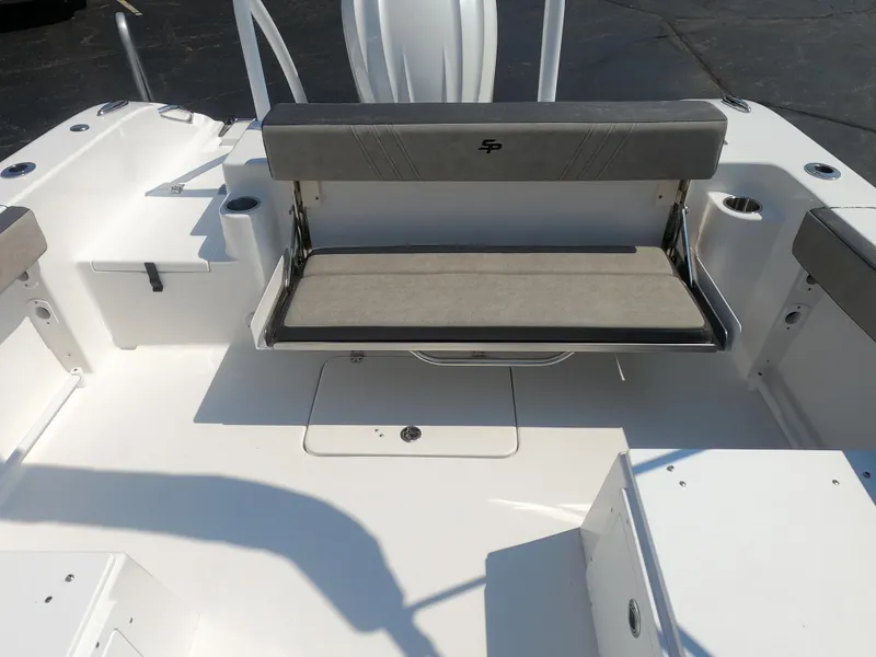 Slide: The Image of 2024 Sea Pro 240 Dual Console boat interior with Sea Pro branding. - 9