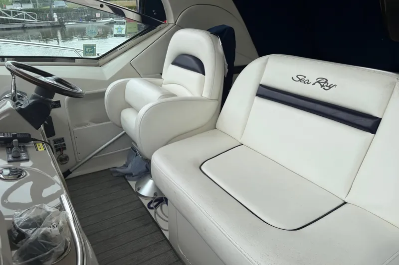 Slide: The Image of Dashboard gauges of a 2008 Sea Ray 380 Sundancer boat. - 19