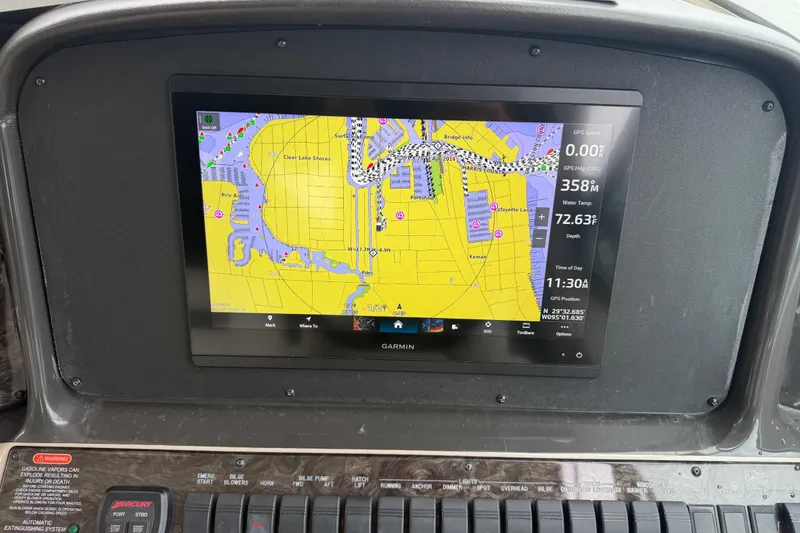 Slide: The Image of Control panel of a 2008 Sea Ray 380 Sundancer with Garmin navigation system. - 21