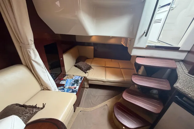 Slide: The Image of Interior of 2008 Sea Ray 380 Sundancer yacht with kitchen and seating area. - 36