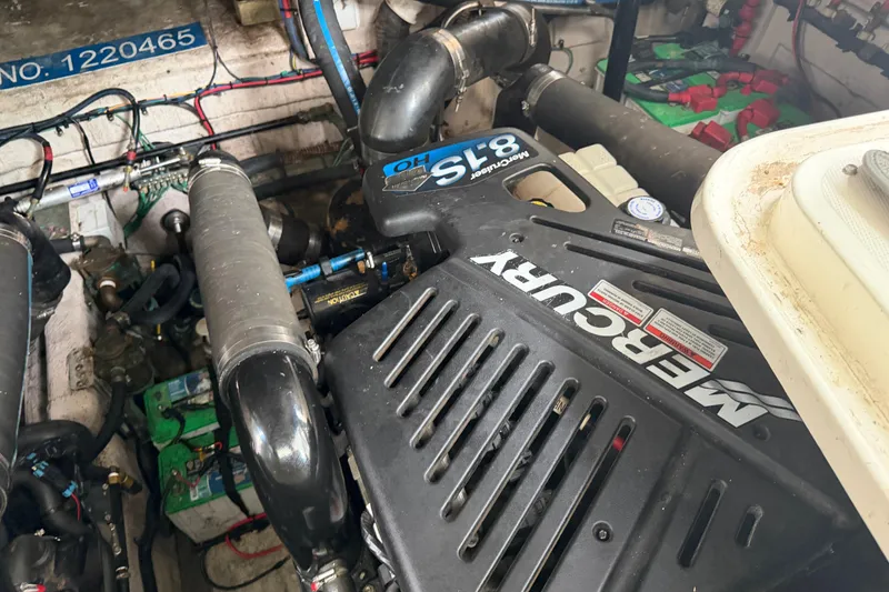 Slide: The Image of Engine compartment of a 2008 Sea Ray 380 Sundancer with Mercury engine. - 39