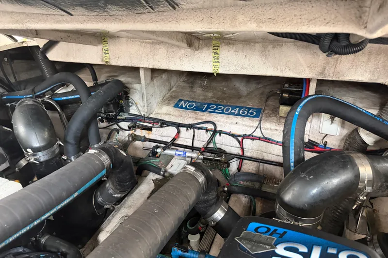 Slide: The Image of Engine compartment of a 2008 Sea Ray 380 Sundancer with Mercury engine. - 42