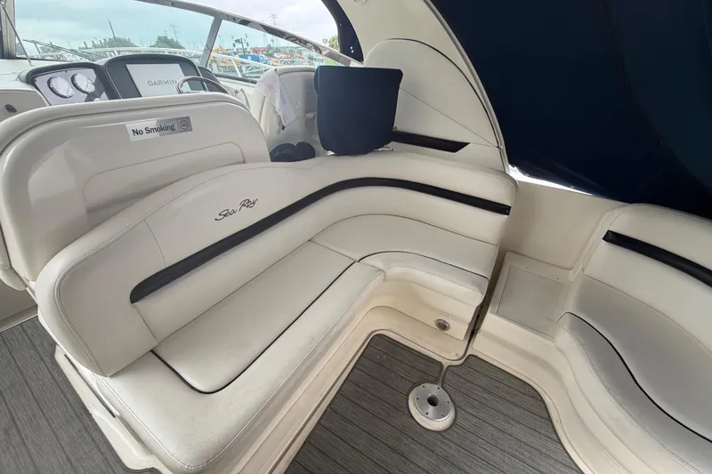 Slide: The Image of Interior of 2008 Sea Ray 380 Sundancer with TV and luxurious seating. - 9