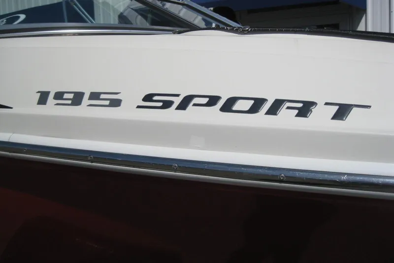 Slide: The Image of 2008 Sea Ray 195 Sport boat side view with model name displayed. - 5