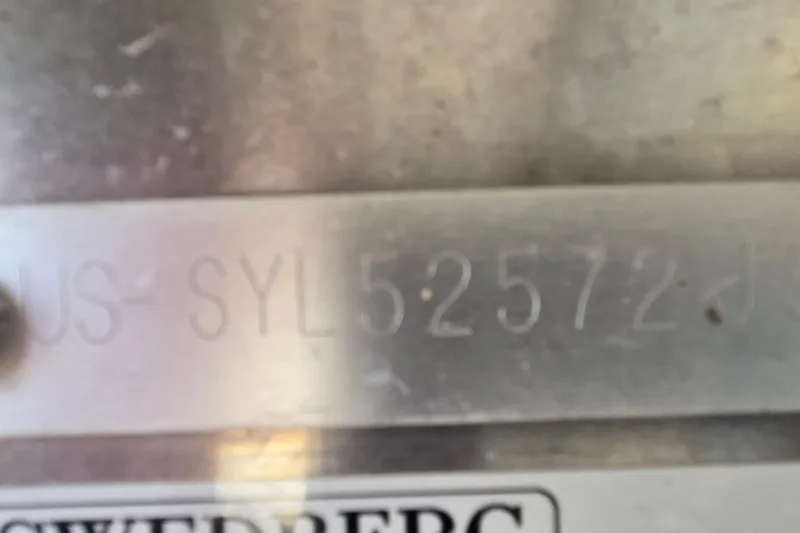 Slide: The Image of Close-up of a 2016 Sylvan Mirage Cruise 8522 LZ hull identification number. - 24