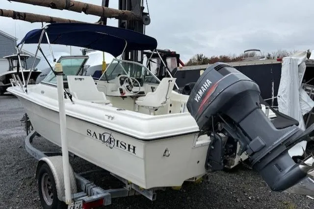 Slide: The Image of 2001 Sailfish 198 DC boat with Yamaha outboard motor on trailer. - 6