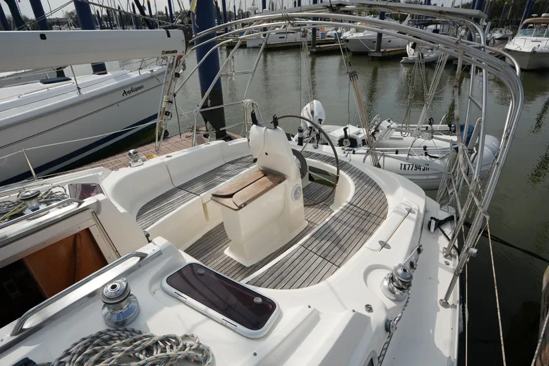 Slide: The Image of Cockpit of a 2007 Bavaria 37 C sailboat docked at a marina. - 10