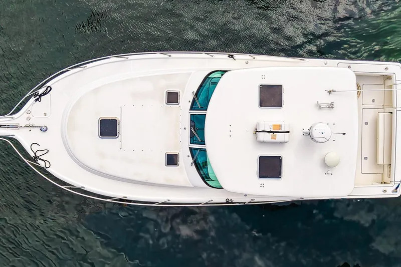 Slide: The Image of Aerial view of 2005 Tiara Yachts 3800 Open on water. - 11
