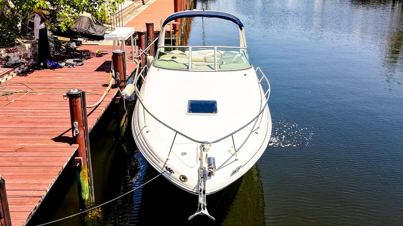 Slide: The Image of 2007 Sea Ray 280 Sundancer docked at a wooden pier on a sunny day. - 4