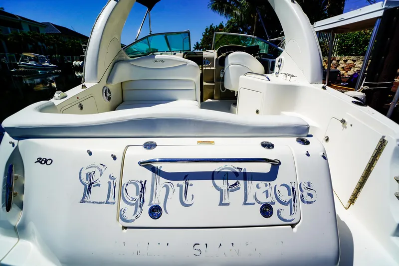 Slide: The Image of 2007 Sea Ray 280 Sundancer boat with "Light Flags" name on the stern. - 7