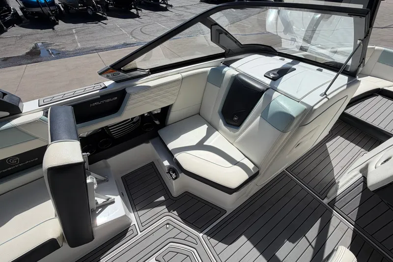 Slide: The Image of 2020 Nautique Super Air Nautique G25 interior with sleek seating and modern design. - 15