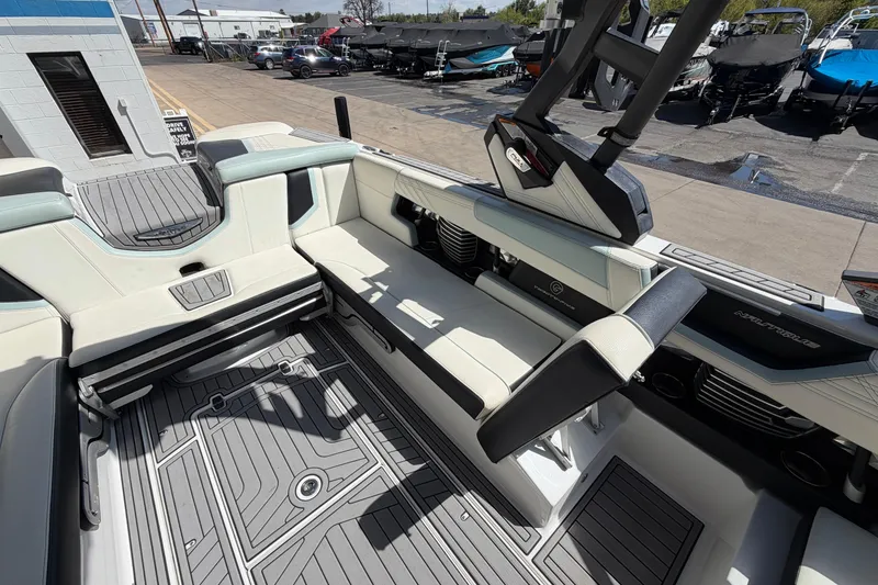 Slide: The Image of 2020 Nautique Super Air Nautique G25 interior with seating and deck details. - 16