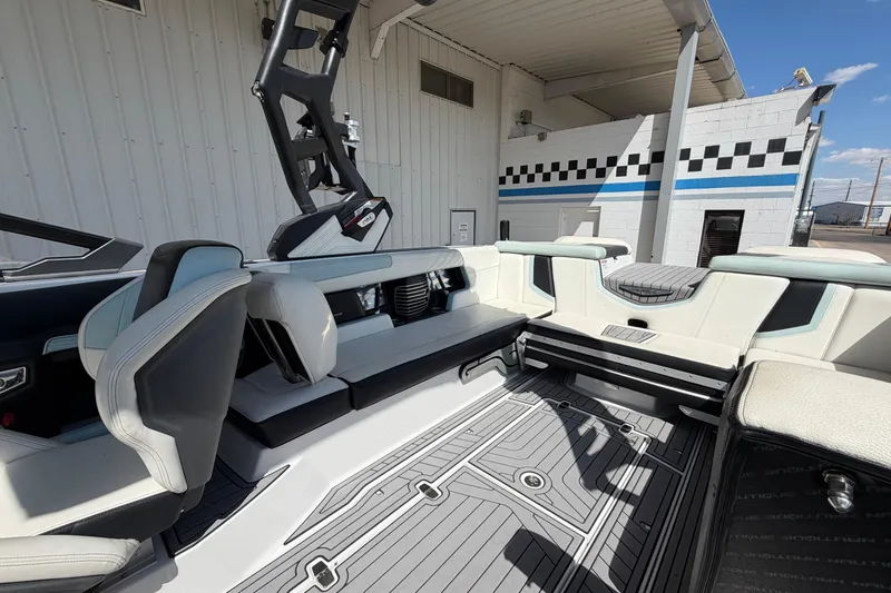 Slide: The Image of 2020 Nautique Super Air Nautique G25 interior with sleek seating and modern design. - 17