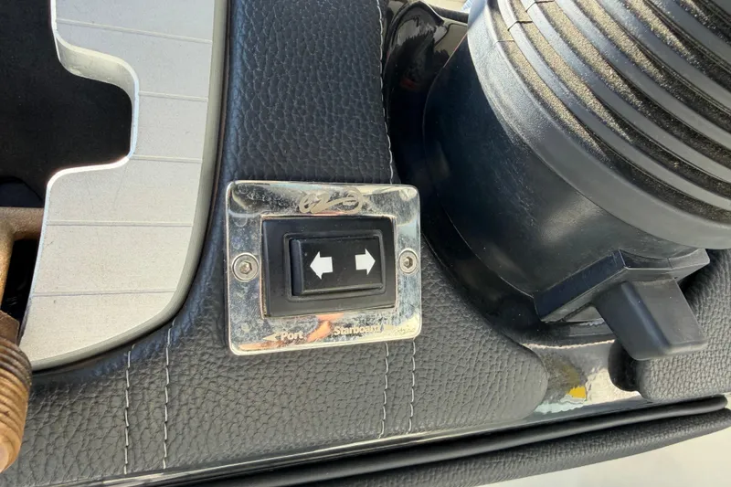 Slide: The Image of 2020 Nautique Super Air Nautique G25 port-starboard switch on dashboard. - 18