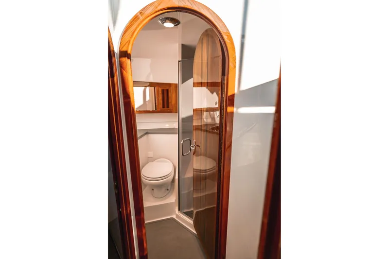 Slide: The Image of Luxurious bathroom in 2019 Lindell 46' yacht with wooden accents and modern fixtures. - 32