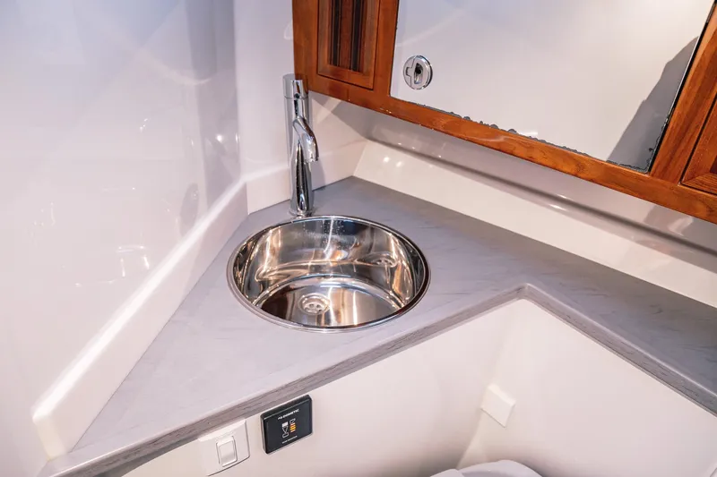 Slide: The Image of Modern bathroom sink with chrome faucet in 2019 Lindell 46' yacht. - 39