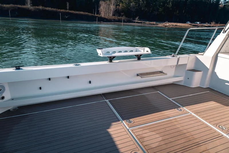 Slide: The Image of Spacious deck of 2019 Lindell 46' yacht with scenic water view. - 54