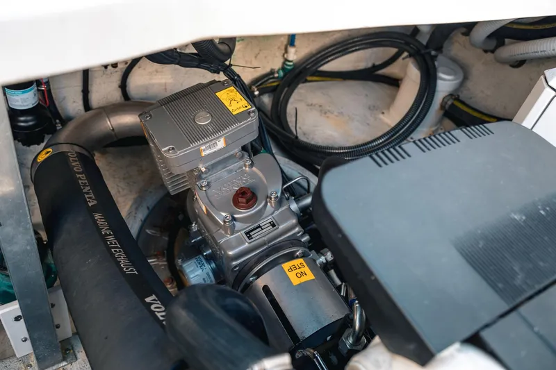 Slide: The Image of Engine compartment of a 2019 Lindell 46' boat featuring Volvo Penta marine components. - 81