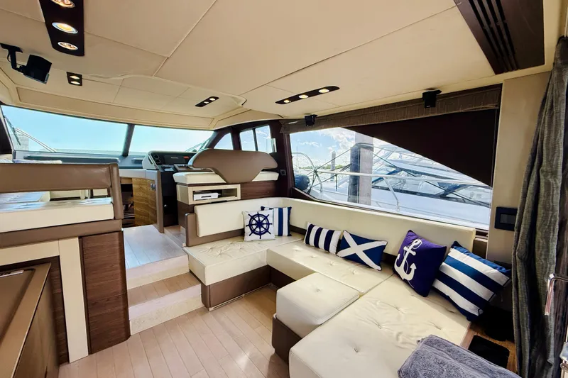 Slide: The Image of Luxurious interior of a 2015 Azimut 50 yacht with nautical-themed decor. - 36
