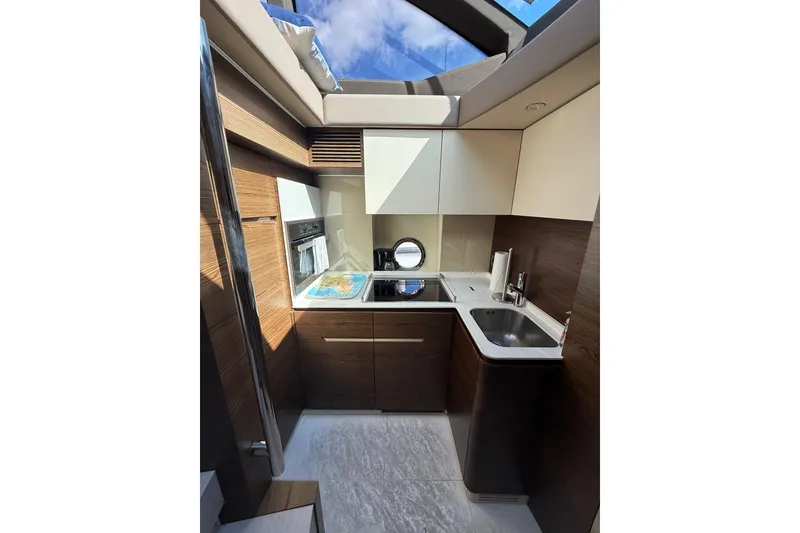 Slide: The Image of Luxurious 2015 Azimut 50 yacht kitchen with modern design and skylight. - 49