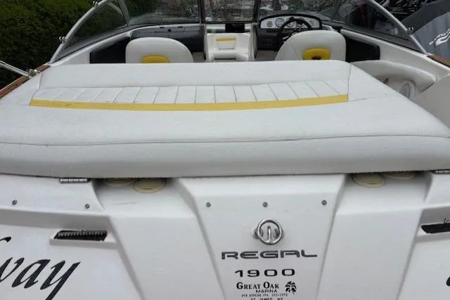 Slide: The Image of 2008 Regal 1900 Bowrider boat interior with white and yellow seating. - 8