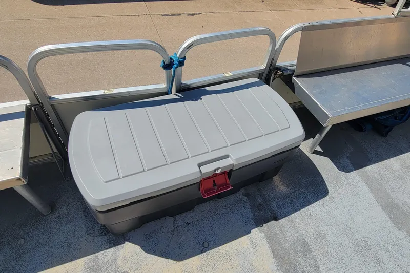 Slide: The Image of Gray storage box on a 2003 Odyssey Millennium boat deck. - 10