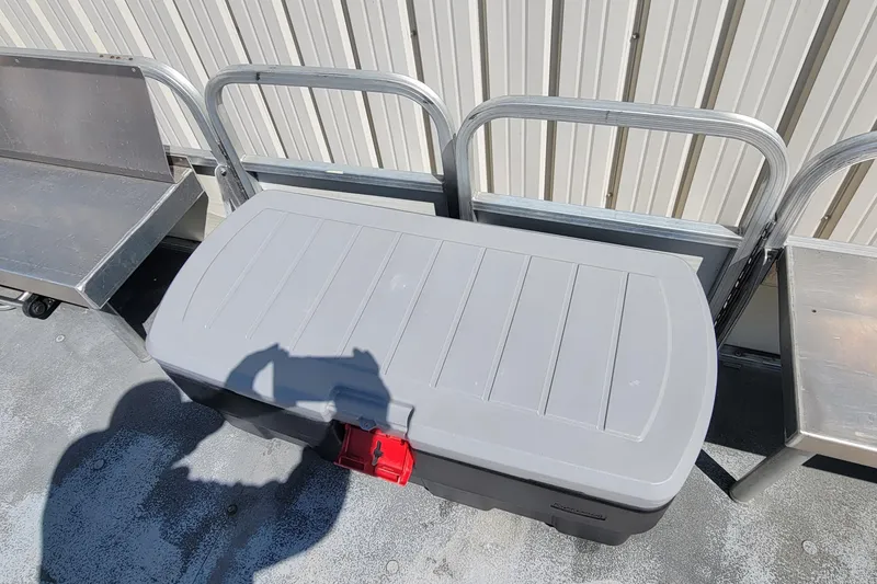 Slide: The Image of Gray storage container with red latch on metal platform, Odyssey Millennium 2003 model. - 9
