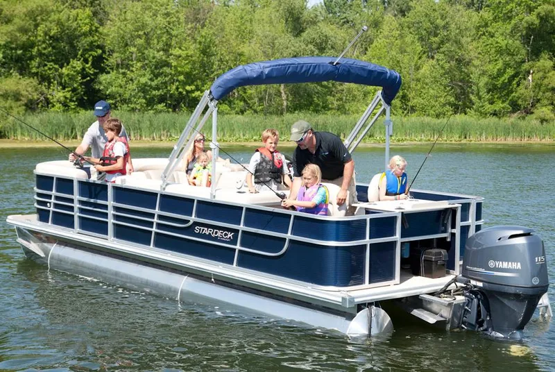 Slide: The Image of Manufacturer Provided Image: 2013 Starcraft Stardeck 236 Cruise-N-Fish pontoon boat with family fishing on a lake. - 20