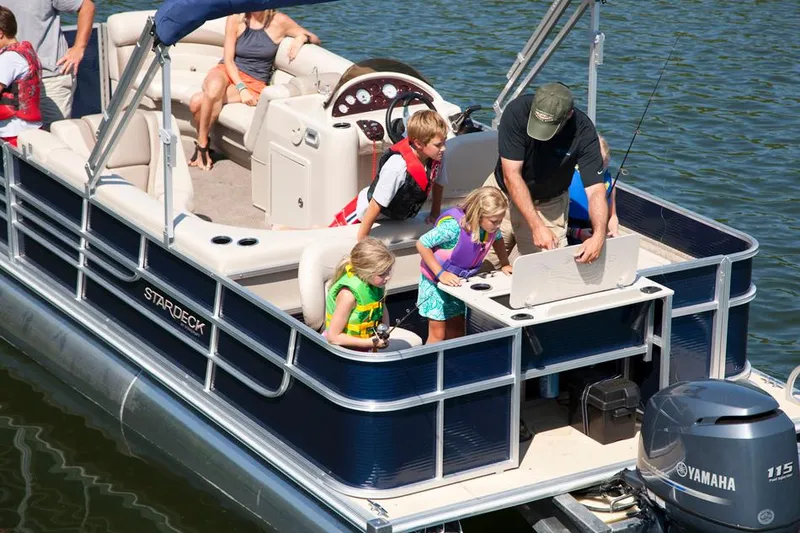 Slide: The Image of Manufacturer Provided Image: 2013 Starcraft Stardeck 236 Cruise-N-Fish pontoon boat with family fishing on the lake. - 22
