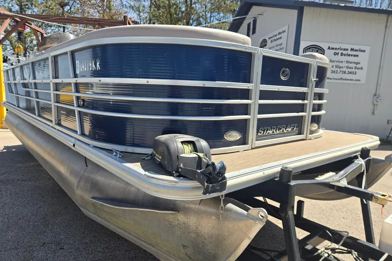 Slide: The Image of 2013 Starcraft Stardeck 236 Cruise-N-Fish pontoon boat on trailer at marina. - 3