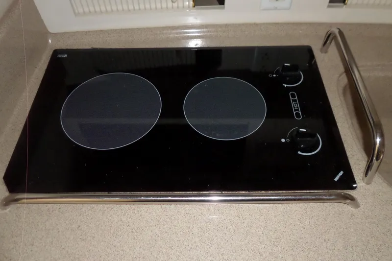 Slide: The Image of Built-in stovetop on 1997 Sea Ray 290 Sundancer yacht kitchen counter. - 31