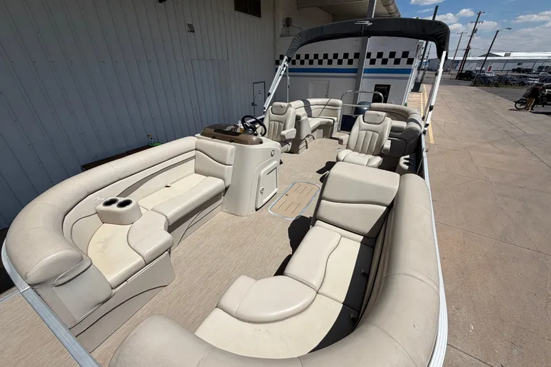 Slide: The Image of 2017 Bennington SX 22 Quad Bench pontoon boat with spacious seating and modern design. - 10