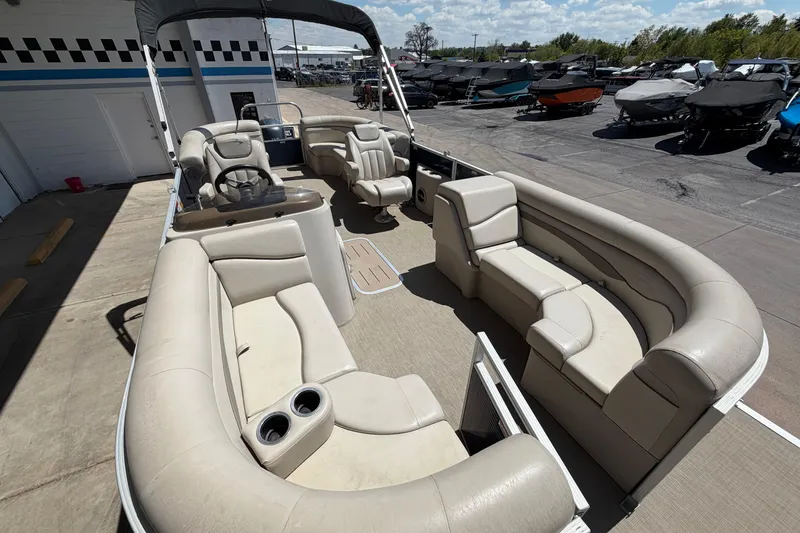 Slide: The Image of 2017 Bennington SX 22 Quad Bench pontoon boat with spacious seating and helm. - 9