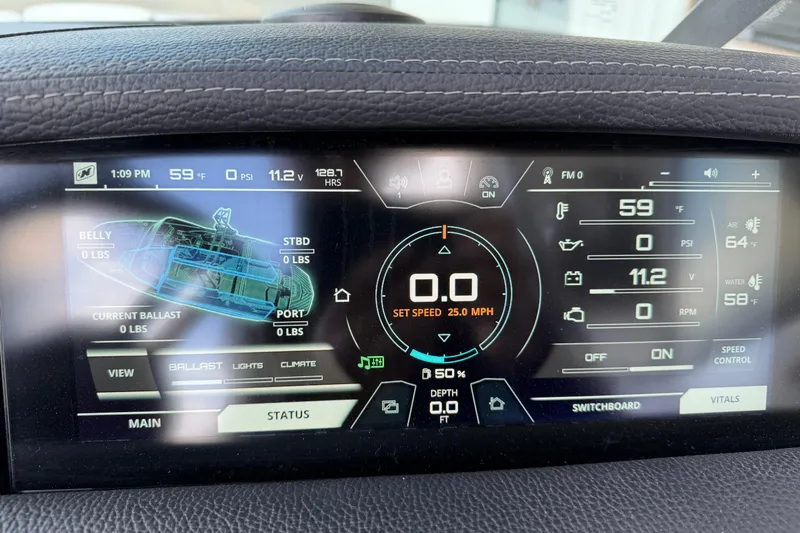 Slide: The Image of Dashboard display of a 2019 Nautique Super Air Nautique GS22 boat, showing speed and ballast settings. - 12