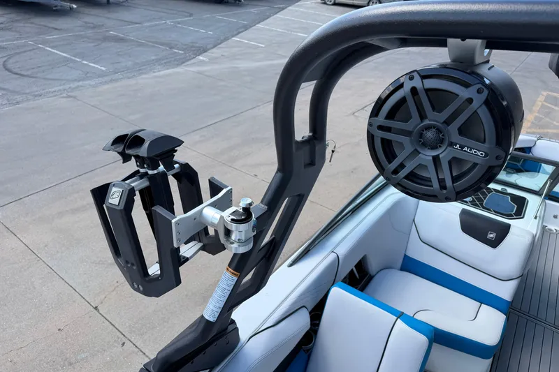 Slide: The Image of 2019 Nautique Super Air Nautique GS22 boat with JL Audio speaker and wakeboard rack. - 19