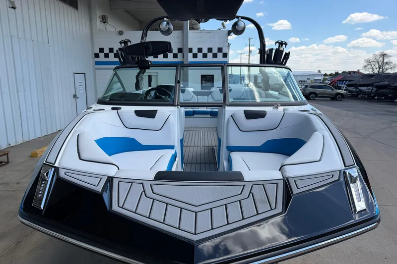 Slide: The Image of 2019 Nautique Super Air Nautique GS22 boat with sleek design and spacious seating. - 9