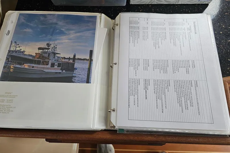 Slide: The Image of Photo album with Ranger Tugs R-31 CB boat and specifications. - 19