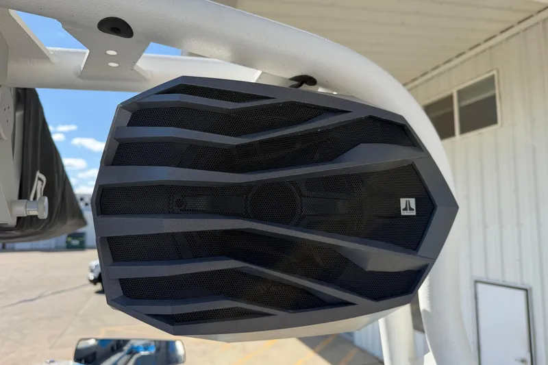 Slide: The Image of Close-up of a speaker on a 2025 Nautique Super Air Nautique GS24 boat. - 20