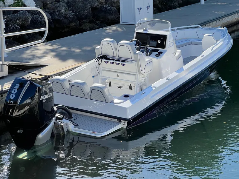 The Image of 2025 Concept 23 boat with Mercury 300 HP engine at dock. - 0