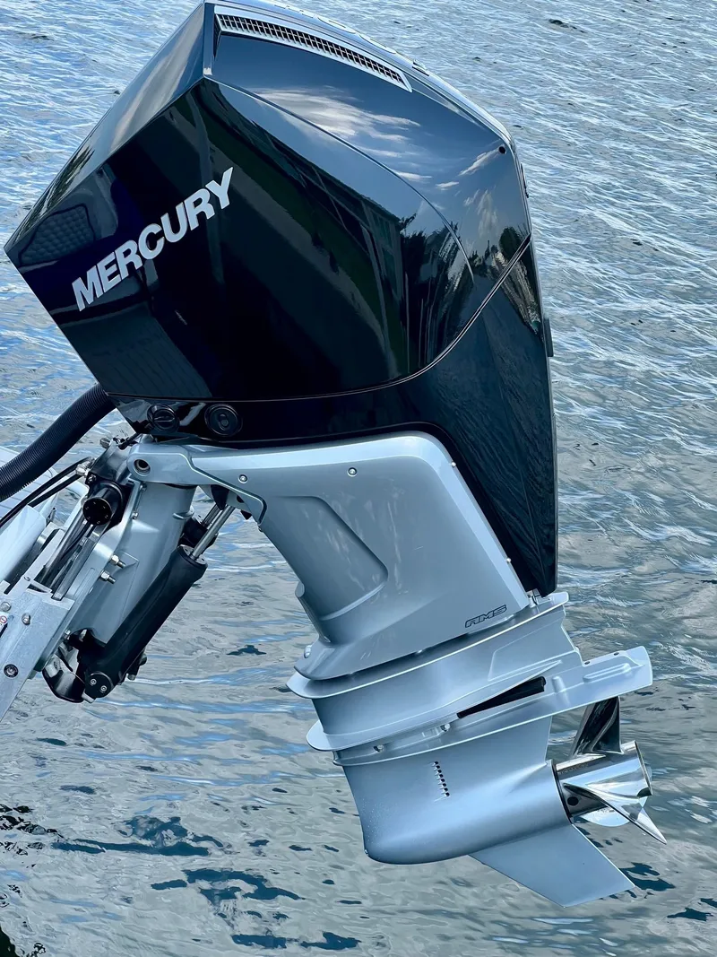 Slide: The Image of Mercury outboard motor Concept 23, model 2025, on calm water. - 12