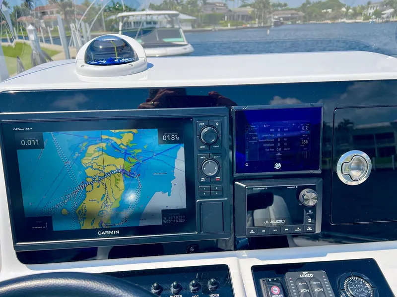 Slide: The Image of Boat cockpit with Garmin navigation system, 2025 Concept 23 model. - 17
