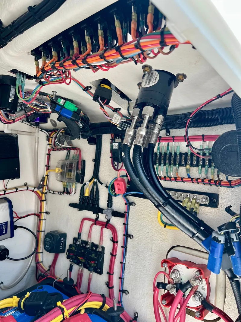 Slide: The Image of Electrical system of a 2025 Concept 23 with wires and fuses. - 19