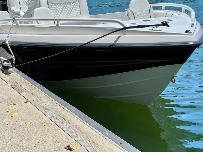 Slide: The Image of 2025 Concept 23 boat docked, modern design. - 4