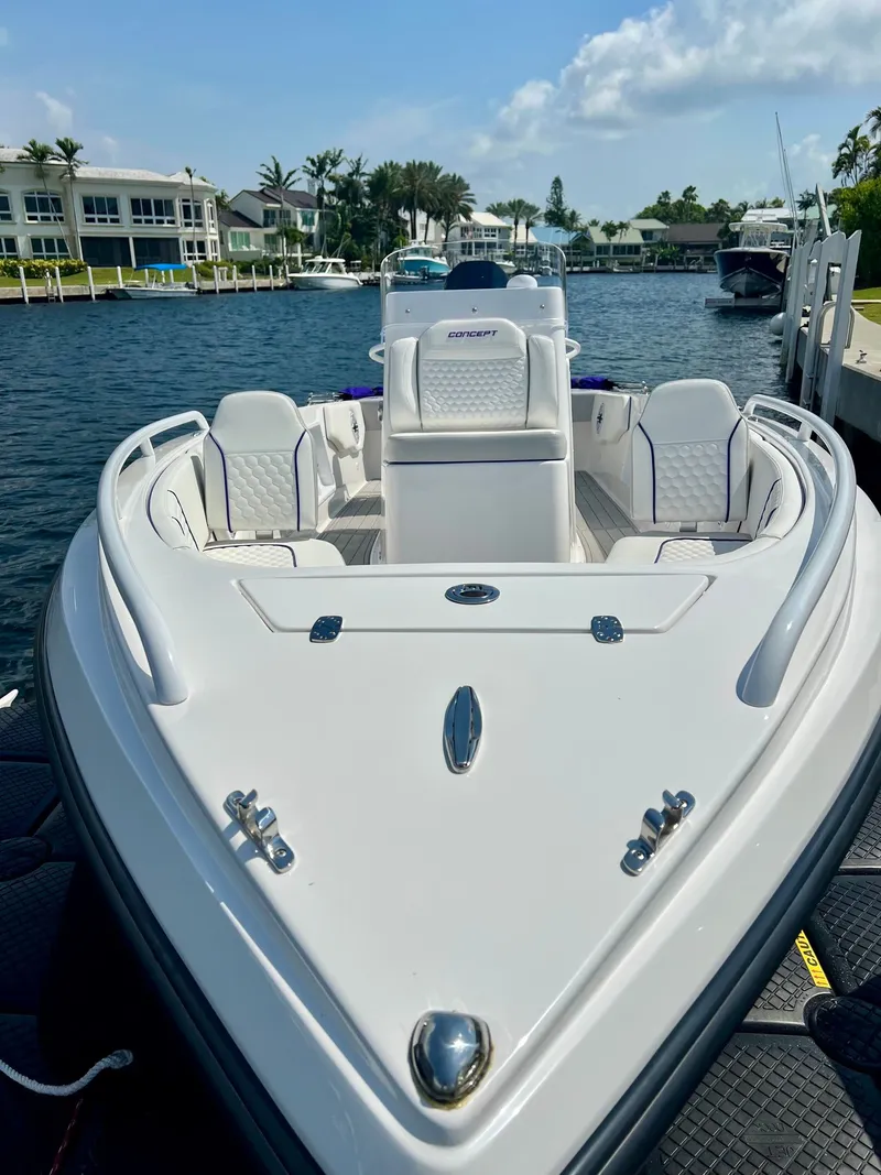 Slide: The Image of 2025 Concept 23 boat docked, modern design. - 5