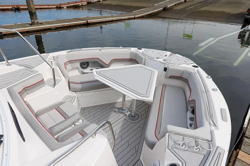 Slide: The Image of Manufacturer Provided Image: Luxurious 2025 Solara S-310 CW boat interior with sleek seating and table. - 14
