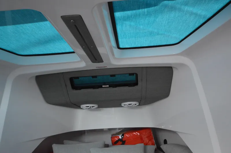 Slide: The Image of Interior view of 2024 Axopar 37 XC Cross Cabin with skylights and modern design. - 36