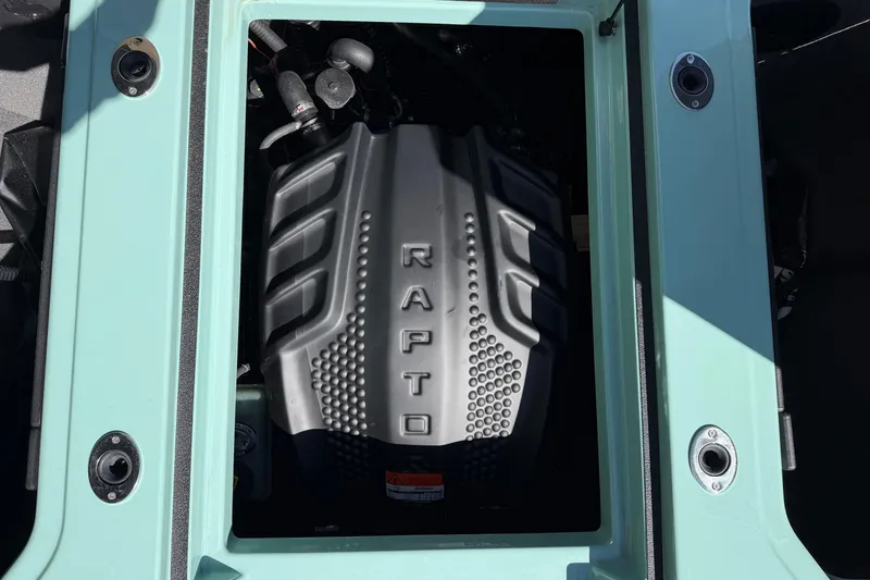 Slide: The Image of 2025 Moomba Mojo engine compartment featuring a Raptor engine cover. - 19