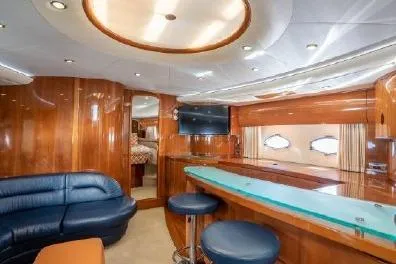 Slide: The Image of Luxurious interior of 2003 Viking Princess 65 yacht with elegant wood finishes and modern amenities. - 17