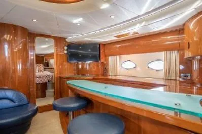 Slide: The Image of Luxurious interior of 2003 Viking Princess 65 yacht with elegant wood finishes and modern amenities. - 19